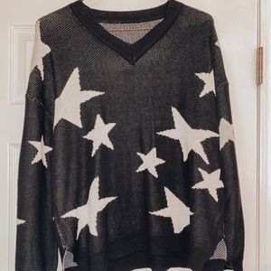 Black sweater with stars